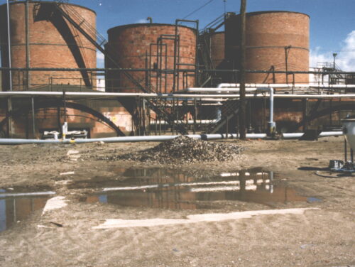 VRP12 Amoco Refinery - Before - brown tanks